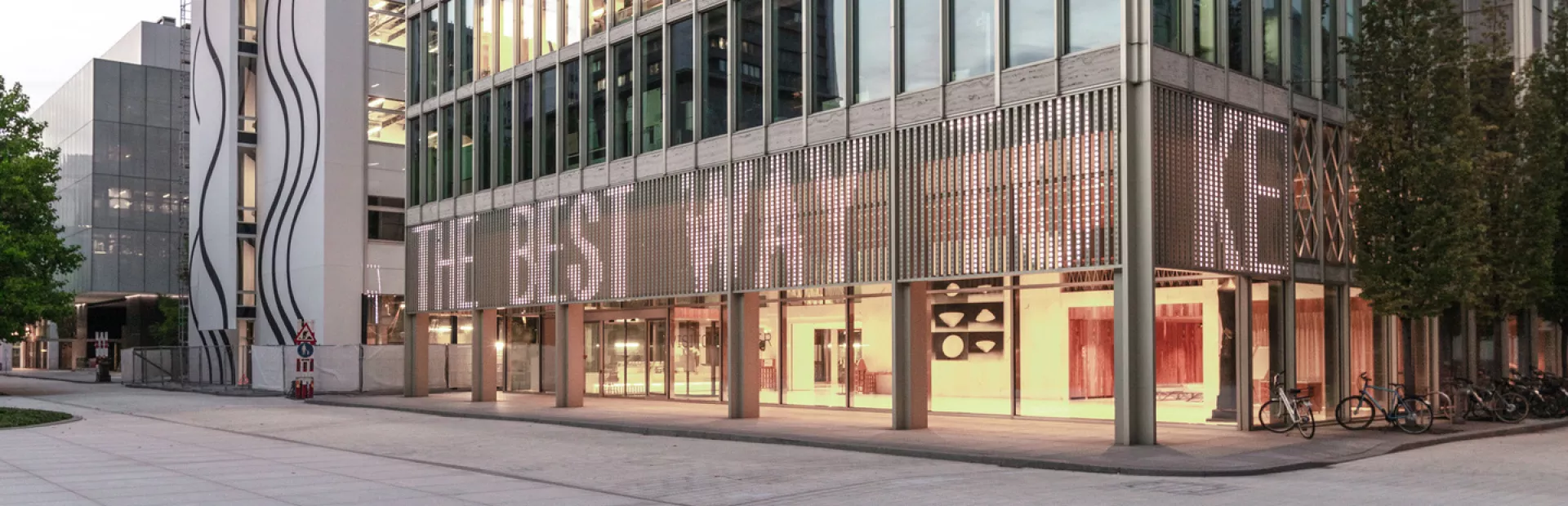 A building with LED artwork, displaying a typographic message, built into the frontage