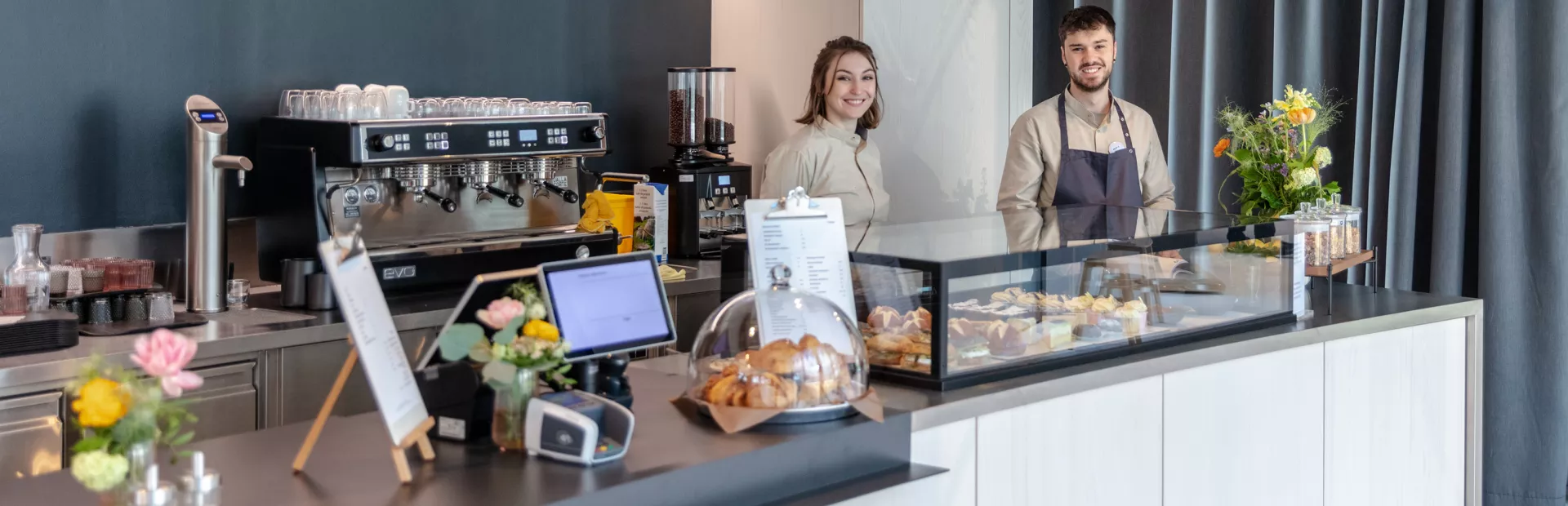 Two baristas of the Novartis Pavillon Café