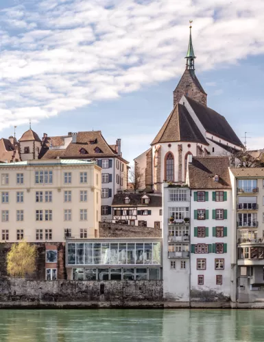 The city of Basel with the Rhine river in the foreground